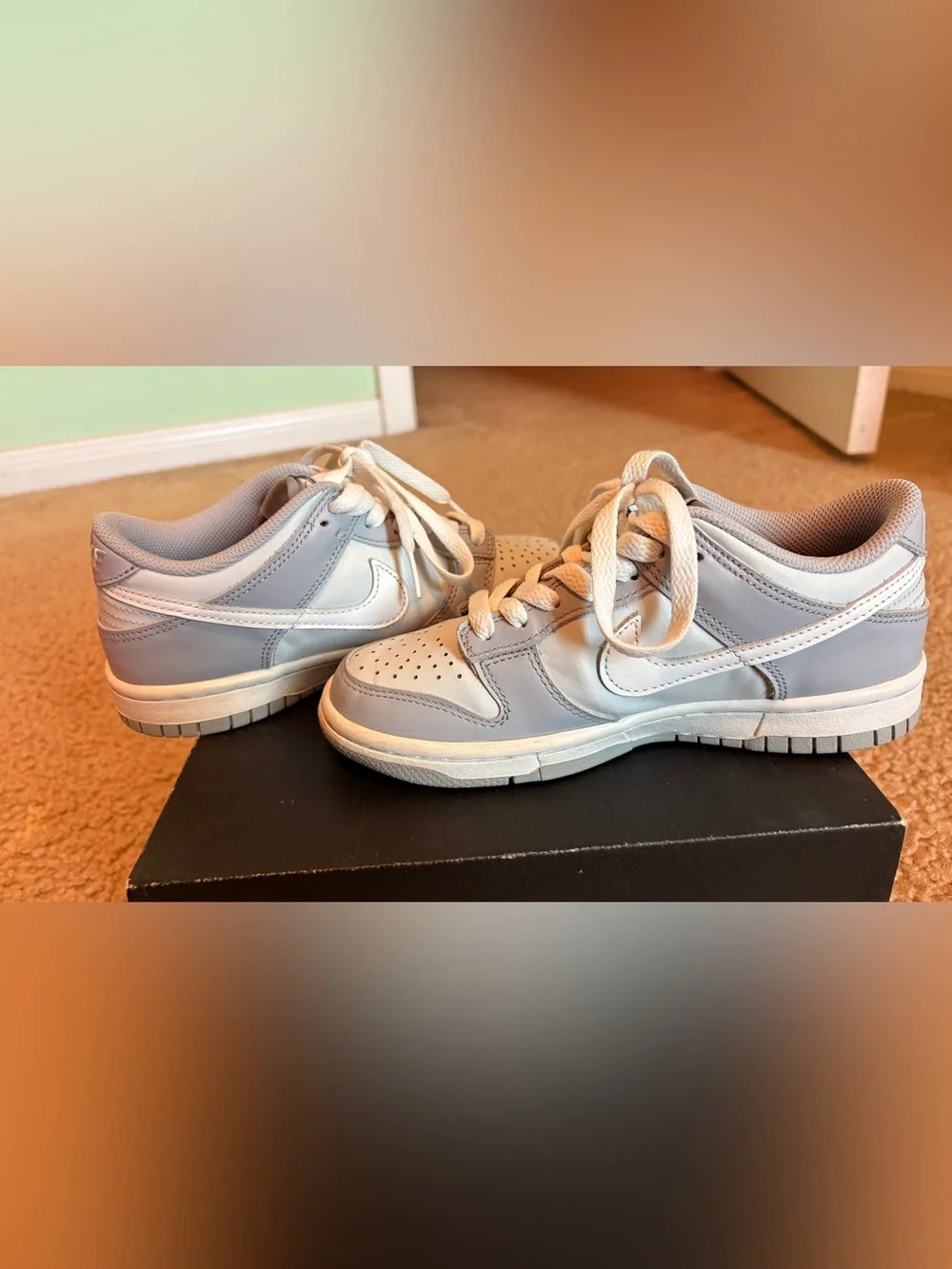 Nike Kids Low-Top Sneakers in Pale Blue and White with no creases.